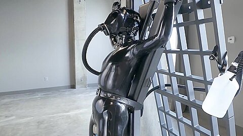 Latexgirl Tied To Cross And Vibed While Rebreather