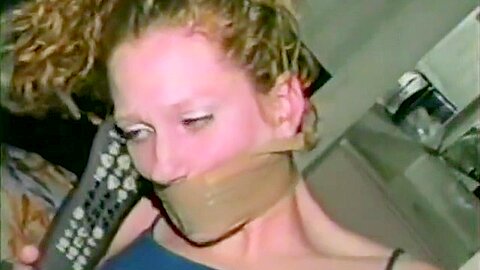 Girl Wrap Gagged With Brown Tape...