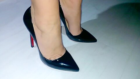Businesswoman Legs In Expensive Pair Of Black Shoes...