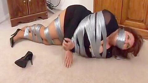 The Wraps This Milf Real Tight In Duct Tape...