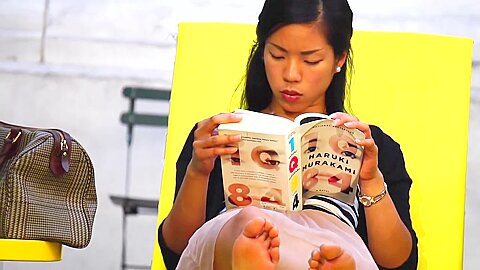 Beautiful Asian Girl Reveals Incredible Feet As She Reads Book In Public