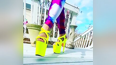 Stunner Walking In Her Fluorescent Green High Heels On The Porch...