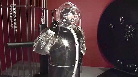 Latex catsuit full encased in inflatable...