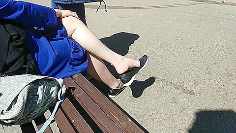 Amateur Girl Gets Filmed Dangling Her Flat Shoes In Public...
