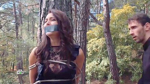 Russian Woman Tape Gagged And Tied To A Tree...
