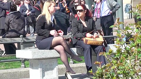 Spying Camera Captures Hot Businesswoman In Public Resting Her Feet In Nylon Stockings...