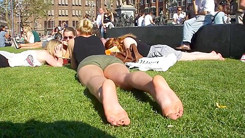 Cute Blonde Sunbathing Her Naked Soles And Feet Local Square...
