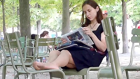 Beautiful Woman Reading The Newspaper And Wearing Nylons Gets Her Feet Candidly Filmed...