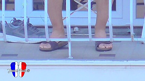 Candid Birkenstock Of A Young Brunette Woman...