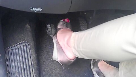 Sexy Woman Sandals Plays Around Gas Pedals...