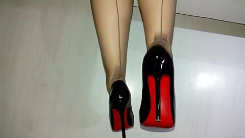Putting On Stockings And Expensive Louboutin Shoes...