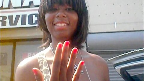 Gorgeous ebony girl talking about nail...