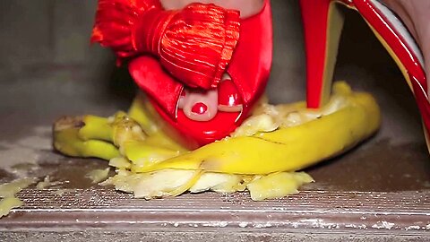 Passionate Woman Crushing Some Bananas With Her High Heels On The Stairs