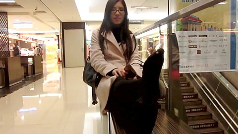 Attractive Asian Sophisticated Woman Exposes Feet At The Shopping Mall...