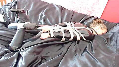 Catsuit Hogtied And Ball Gagged...