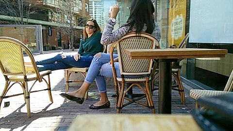 Two Delicious Brunettes Get Their Candid Feet Filmed At The Caffe...