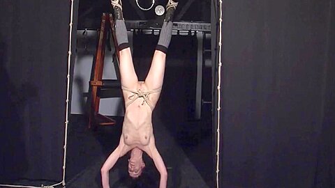In Restrained Bondage Babe Upside Down...